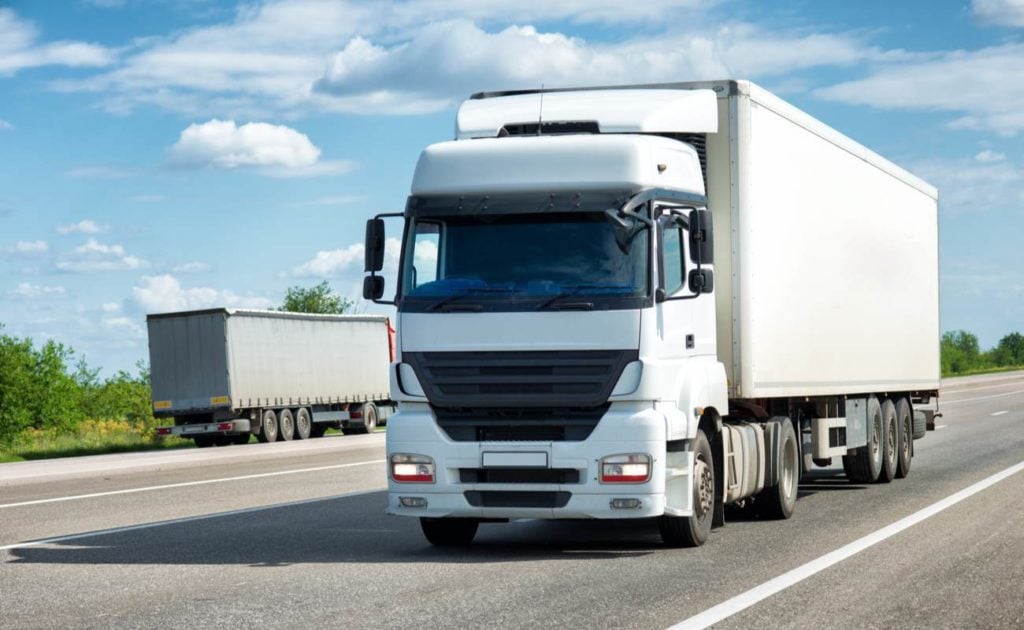 Ekam Transport: Specialized Transportation for 15 FT Box Trailers and Curtain Trailers, Ensuring Safe and Efficient Delivery.